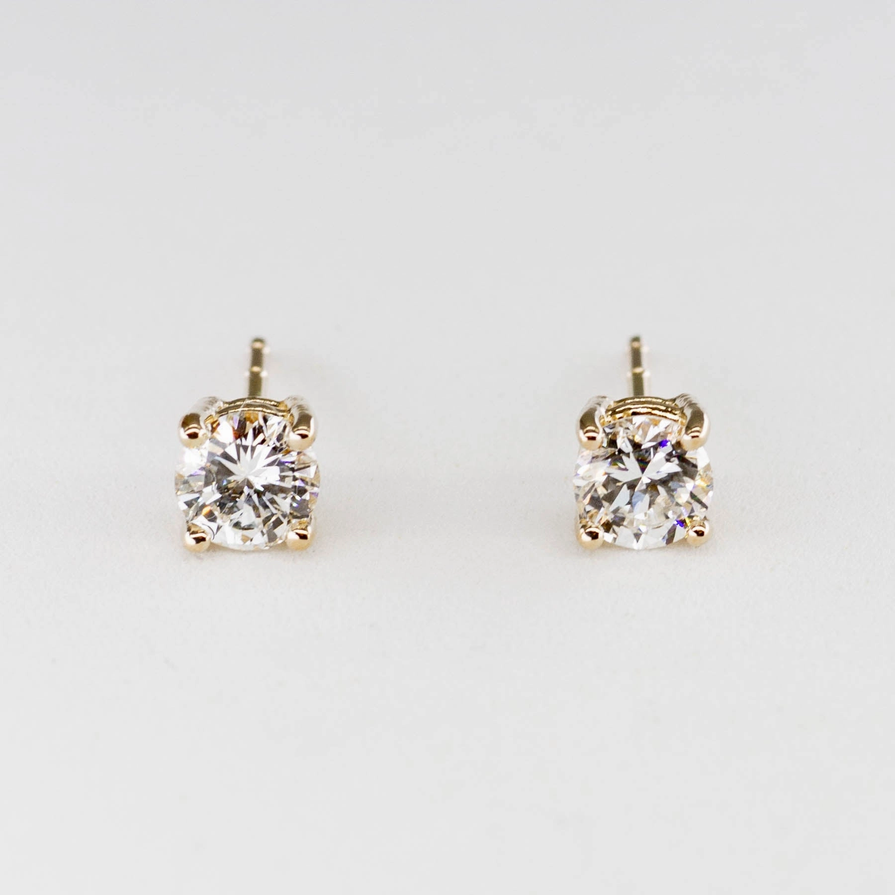 '100 Ways' Classic Solitaire Diamond Stud Earrings | Yellow Gold | 0.57ctw- 0.61ctw | Romantic Touch Polished Line