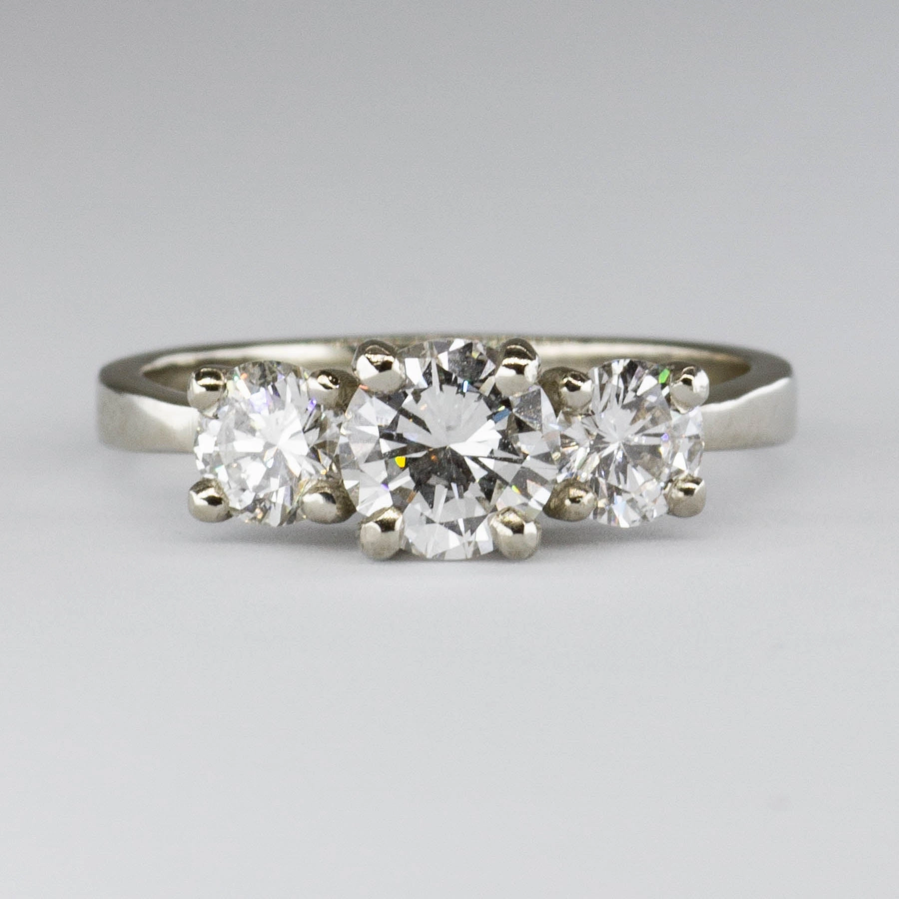 Stylish Look Polished Design '100 Ways' GIA Certified Three Stone Diamond 18k Ring | 0.71 ctw SI1 E, 0.62 ctw | SZ 5.75