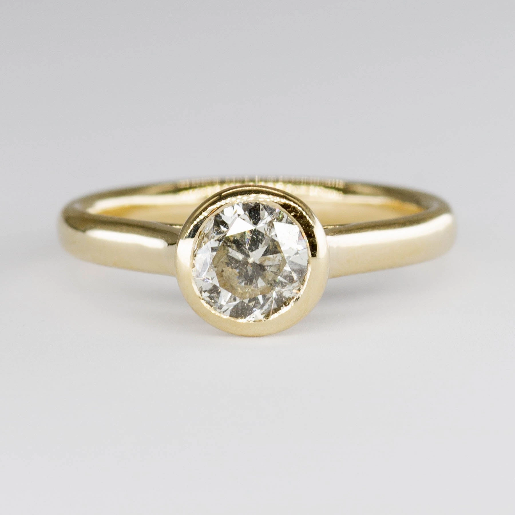 Distinctive Glow Camera Focus '100 Ways' 14k Yellow Gold Bezel Set Solitaire Ring | 1.01ct | SZ 6.75