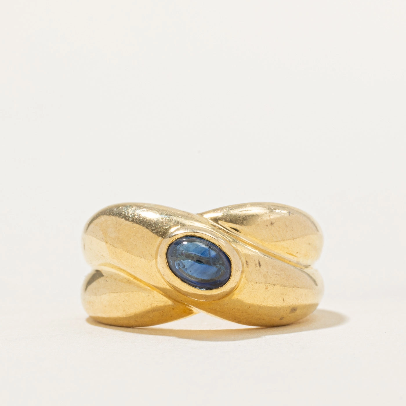 Feminine Light 18k Solitaire Sapphire Chunky Cross Over Ring | 0.87ct | SZ 6.5