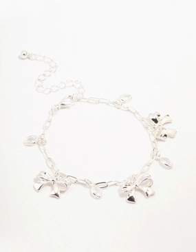 Silver Plated Alternating Cubic Zirconia & Bow Charm Bracelet Vibrant Charm