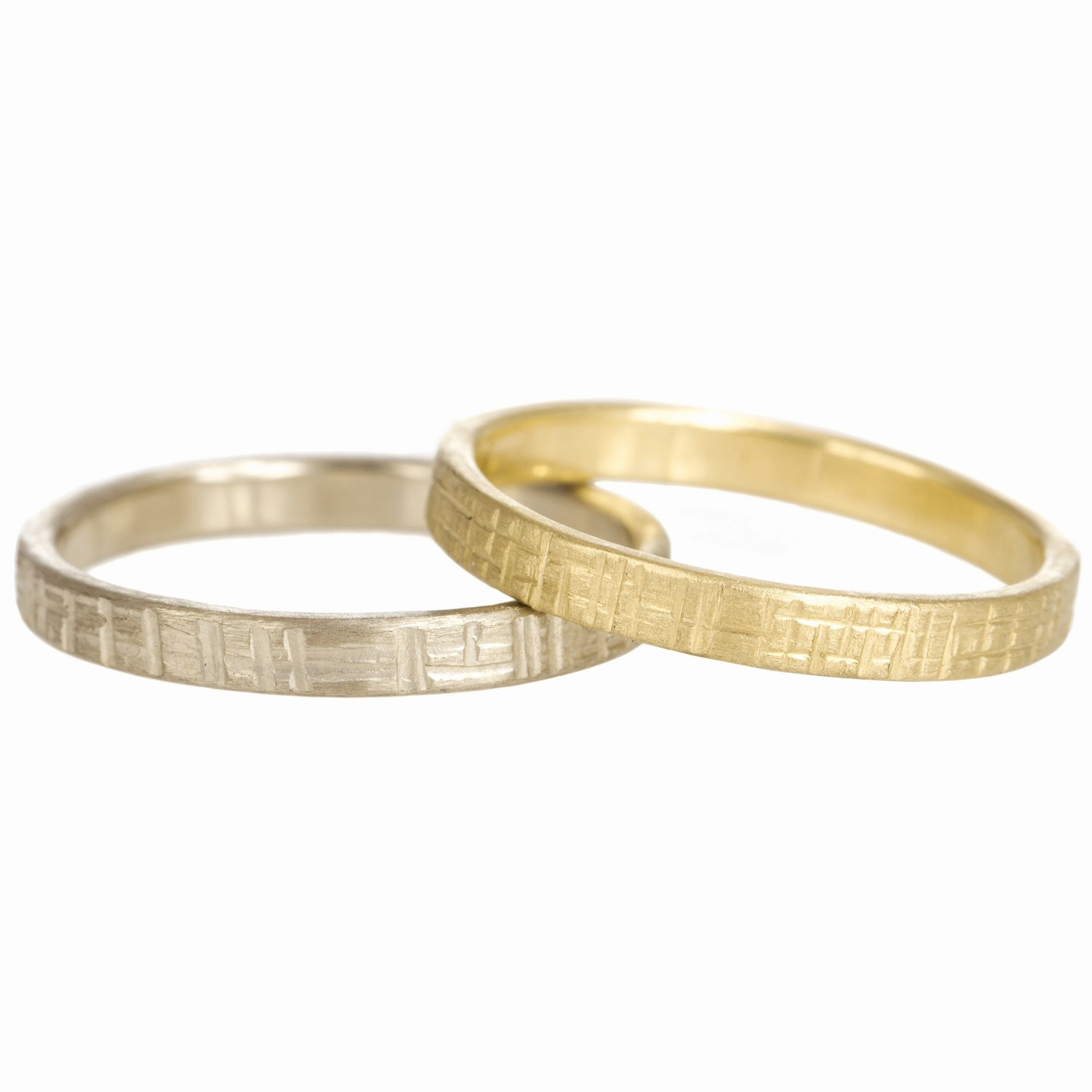 Solid gold, hand forged, crosshatch texture,2.5 mm wide Linear Form