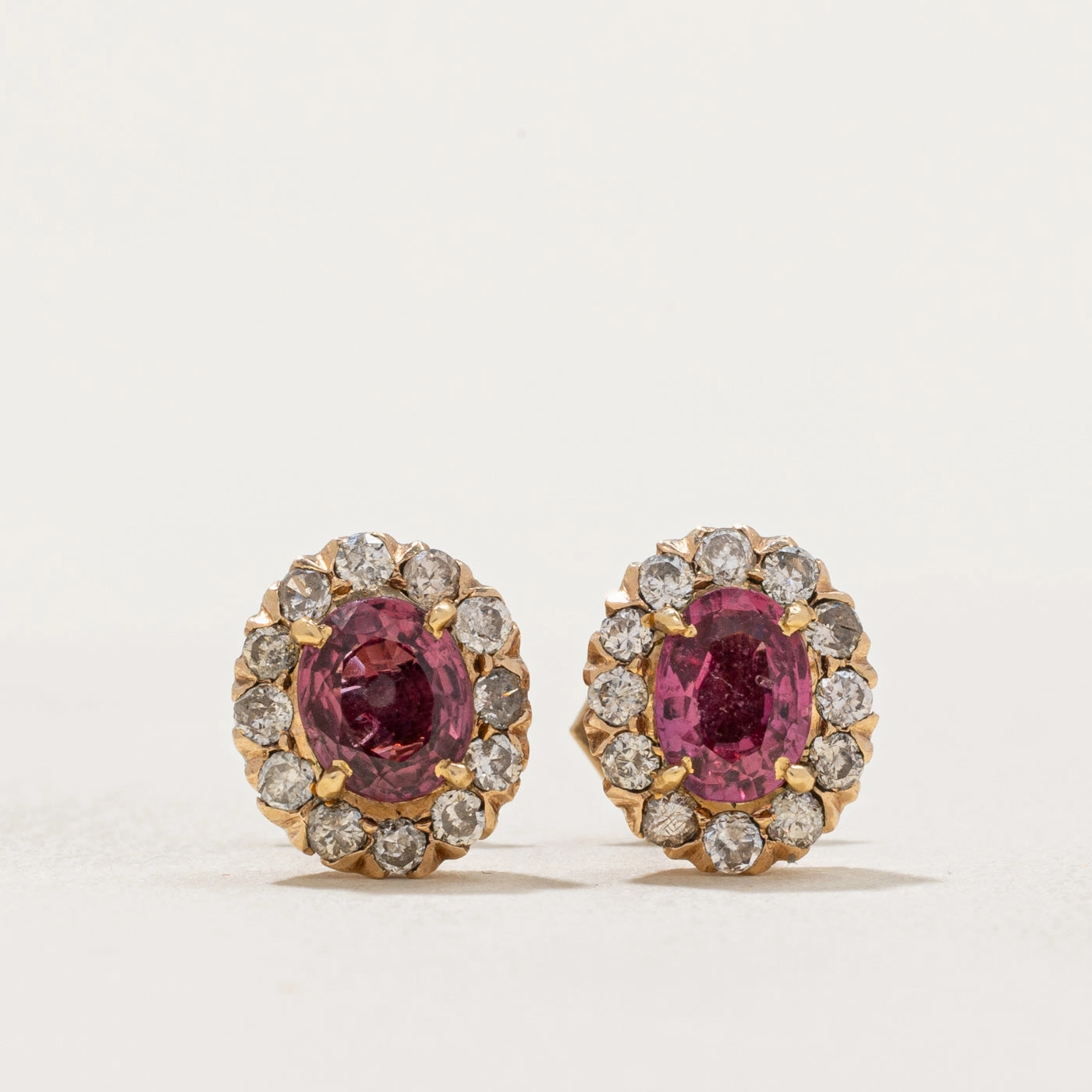 Vintage Oval Cut Ruby & Diamond Halo Stud Earrings | 1.00ctw, 0.36ctw | Elegant Edge Fashion Design